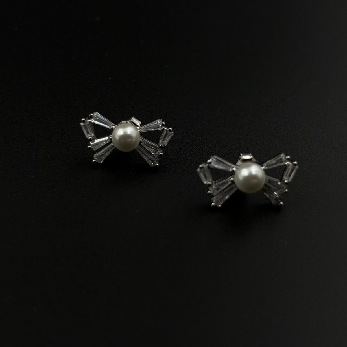 Pearl-Tied Sparkling Bow Stud Set Earrings | 925 Silver