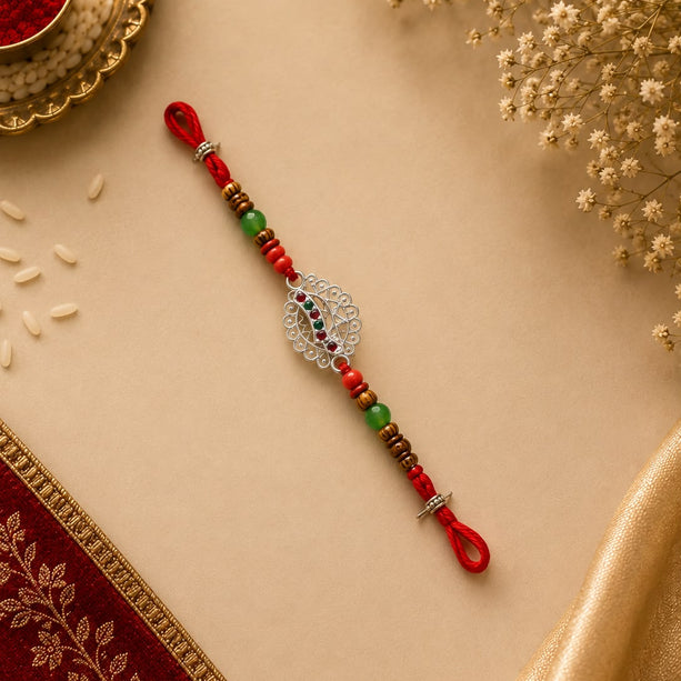 Emerald Filigree Silver Rakhi
